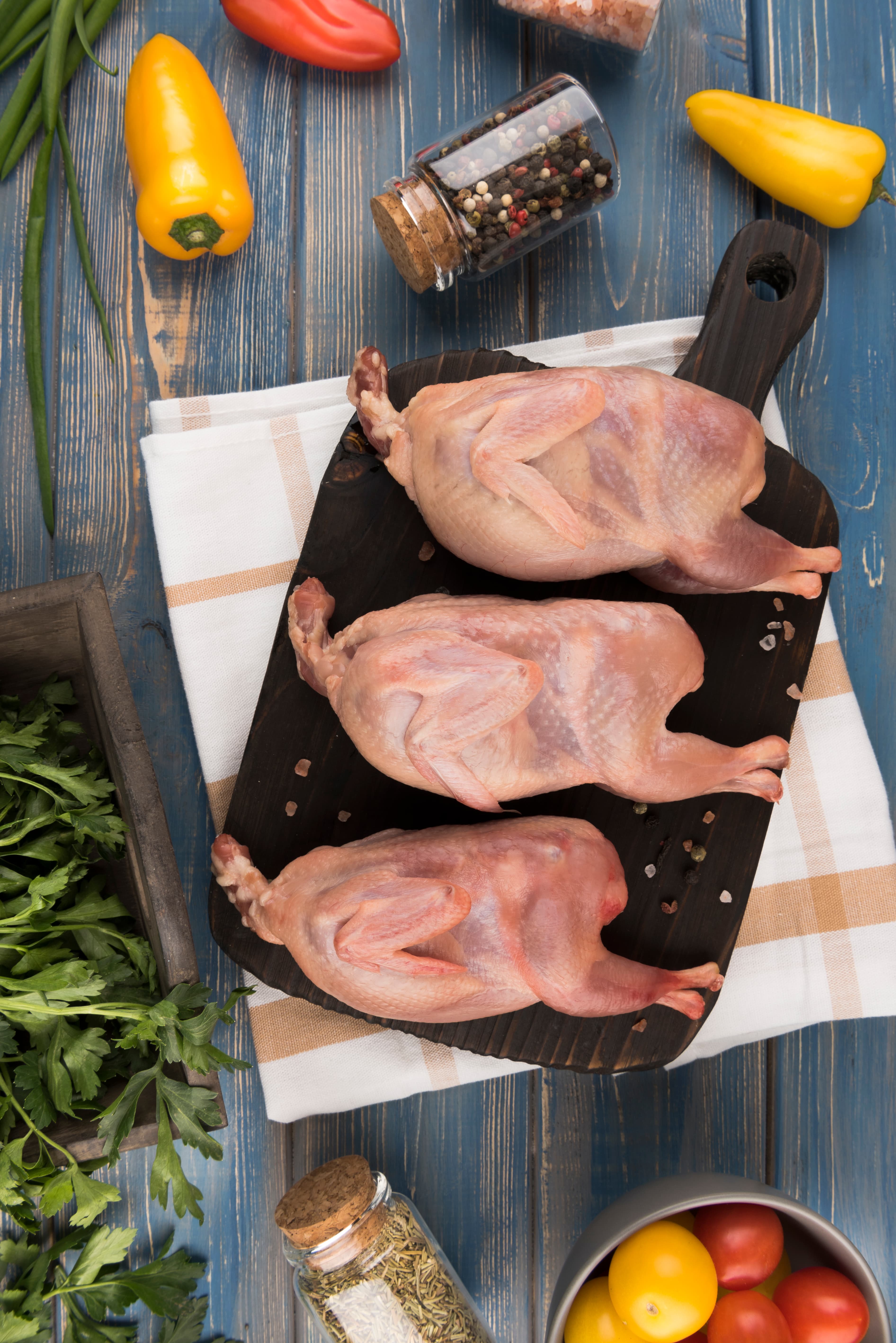 Fresh raw chicken with peppers